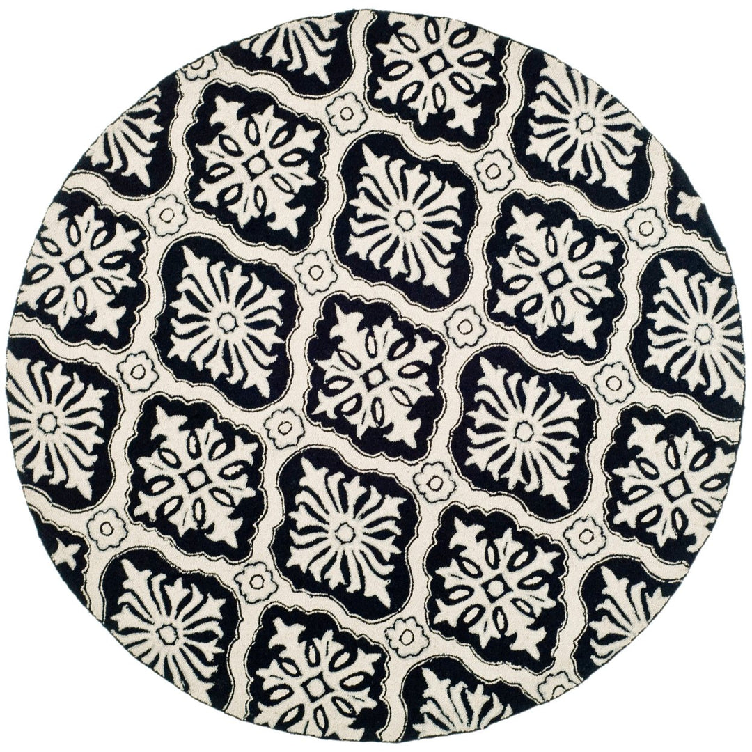 SAFAVIEH Easy Care EZC122C Hand-hooked Black Rug Image 1