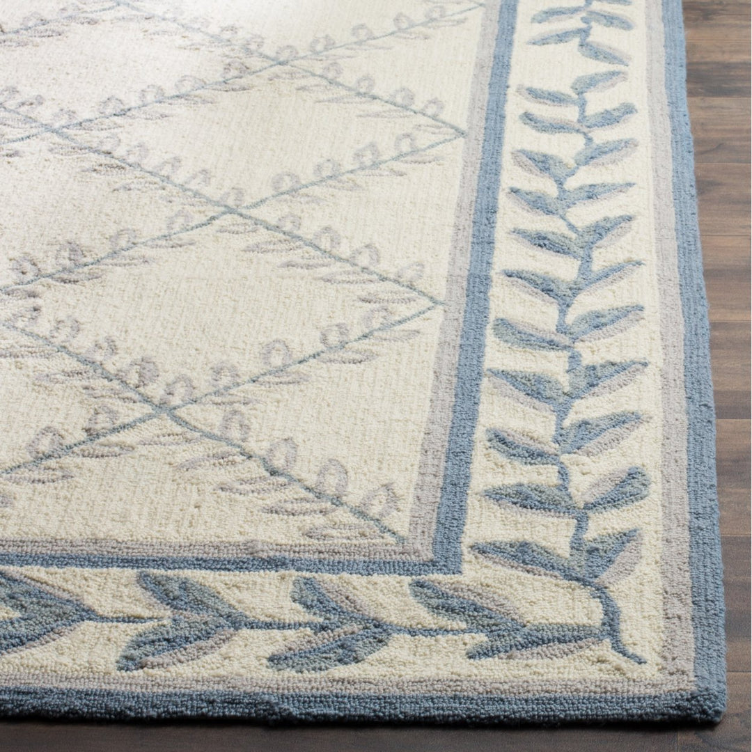 SAFAVIEH Easy Care EZC430A Ivory / Light Blue Rug Image 6