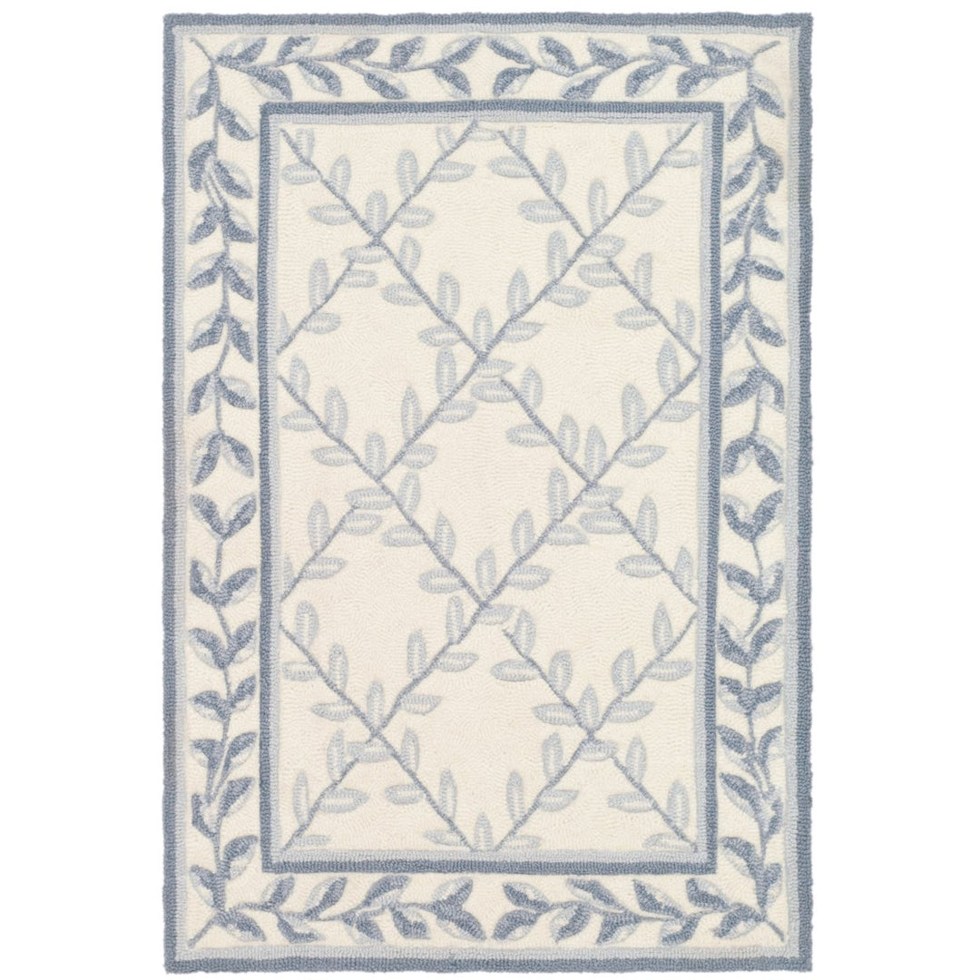 SAFAVIEH Easy Care EZC430A Ivory / Light Blue Rug Image 1