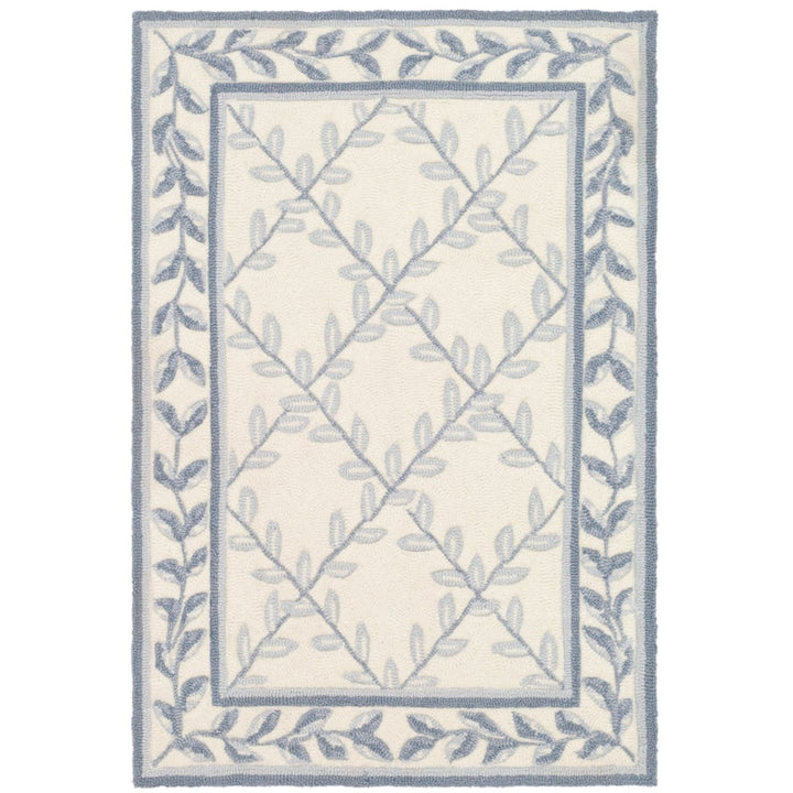 SAFAVIEH Easy Care EZC430A Ivory / Light Blue Rug Image 1