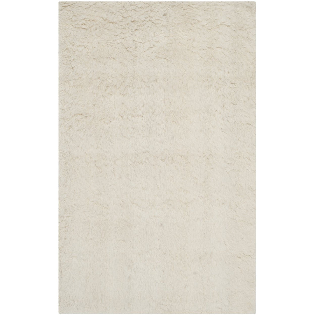 SAFAVIEH Flokati Collection FLK150A Handmade Ivory Rug Image 1