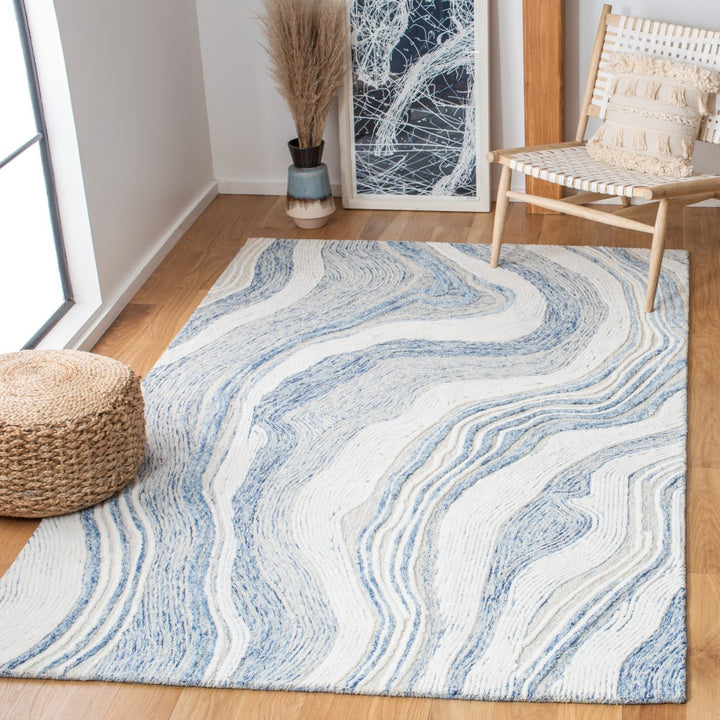 SAFAVIEH Fifth Avenue FTV121M Handmade Blue / Ivory Rug Image 1