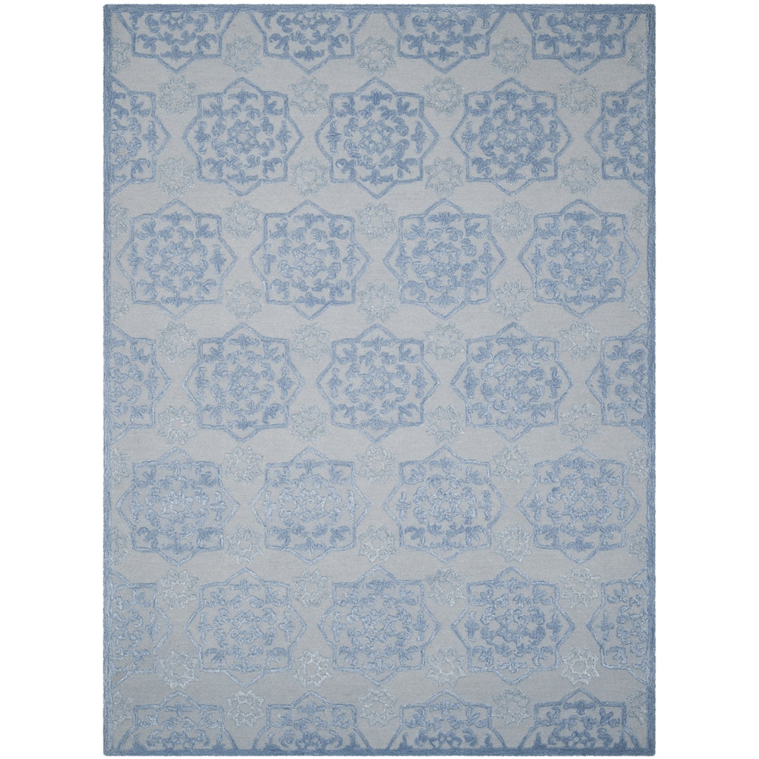 SAFAVIEH Glamour GLM104B Handmade Blue / Ivory Rug Image 1