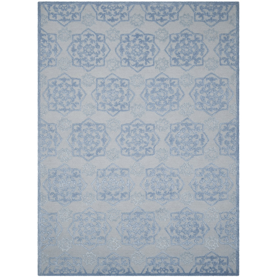 SAFAVIEH Glamour GLM104B Handmade Blue / Ivory Rug Image 1