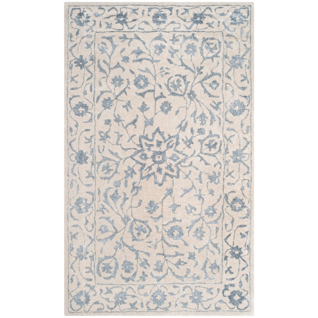 SAFAVIEH Glamour GLM515A Handmade Silver / Ivory Rug Image 1