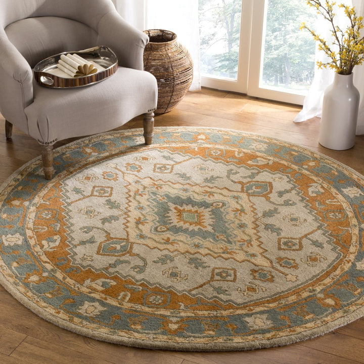 SAFAVIEH Heritage HG406A Handmade Light Blue / Rust Rug Image 2