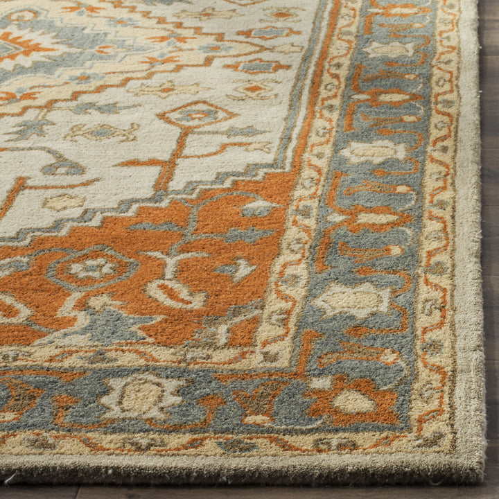 SAFAVIEH Heritage HG406A Handmade Light Blue / Rust Rug Image 7