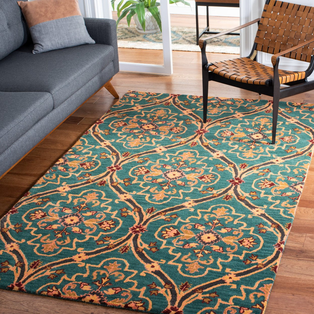 SAFAVIEH Heritage HG475Y Handmade Green / Orange Rug Image 1