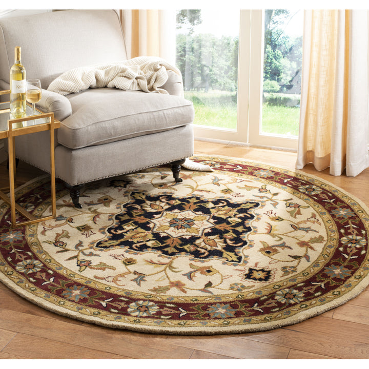 SAFAVIEH Heritage HG760A Handmade Ivory / Red Rug Image 11