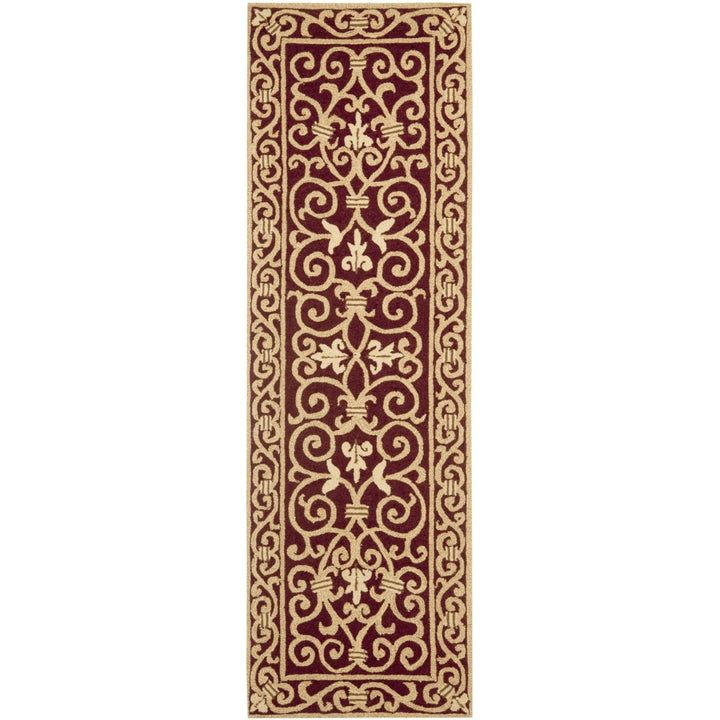 SAFAVIEH Chelsea HK11C Hand-hooked Burgundy Rug Image 1