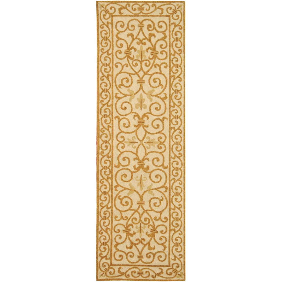 SAFAVIEH Chelsea HK11P Hand-hooked Ivory / Gold Rug Image 1