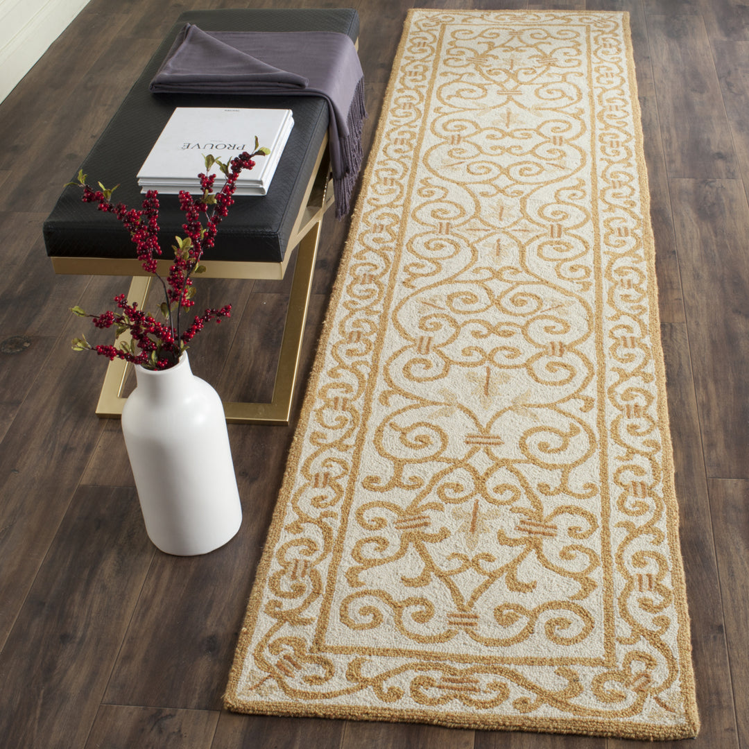 SAFAVIEH Chelsea HK11P Hand-hooked Ivory / Gold Rug Image 11