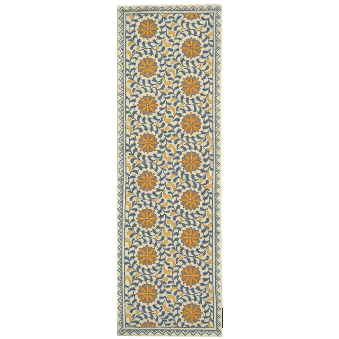 SAFAVIEH Chelsea HK150A Hand-hooked Ivory / Blue Rug Image 1