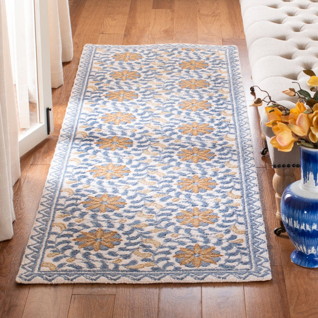 SAFAVIEH Chelsea HK150A Hand-hooked Ivory / Blue Rug Image 10