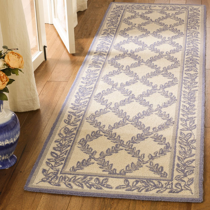 SAFAVIEH Chelsea HK230A Ivory / Light Blue Rug Image 3