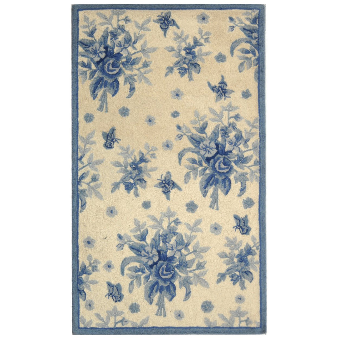 SAFAVIEH Chelsea HK250A Hand-hooked Ivory / Blue Rug Image 1