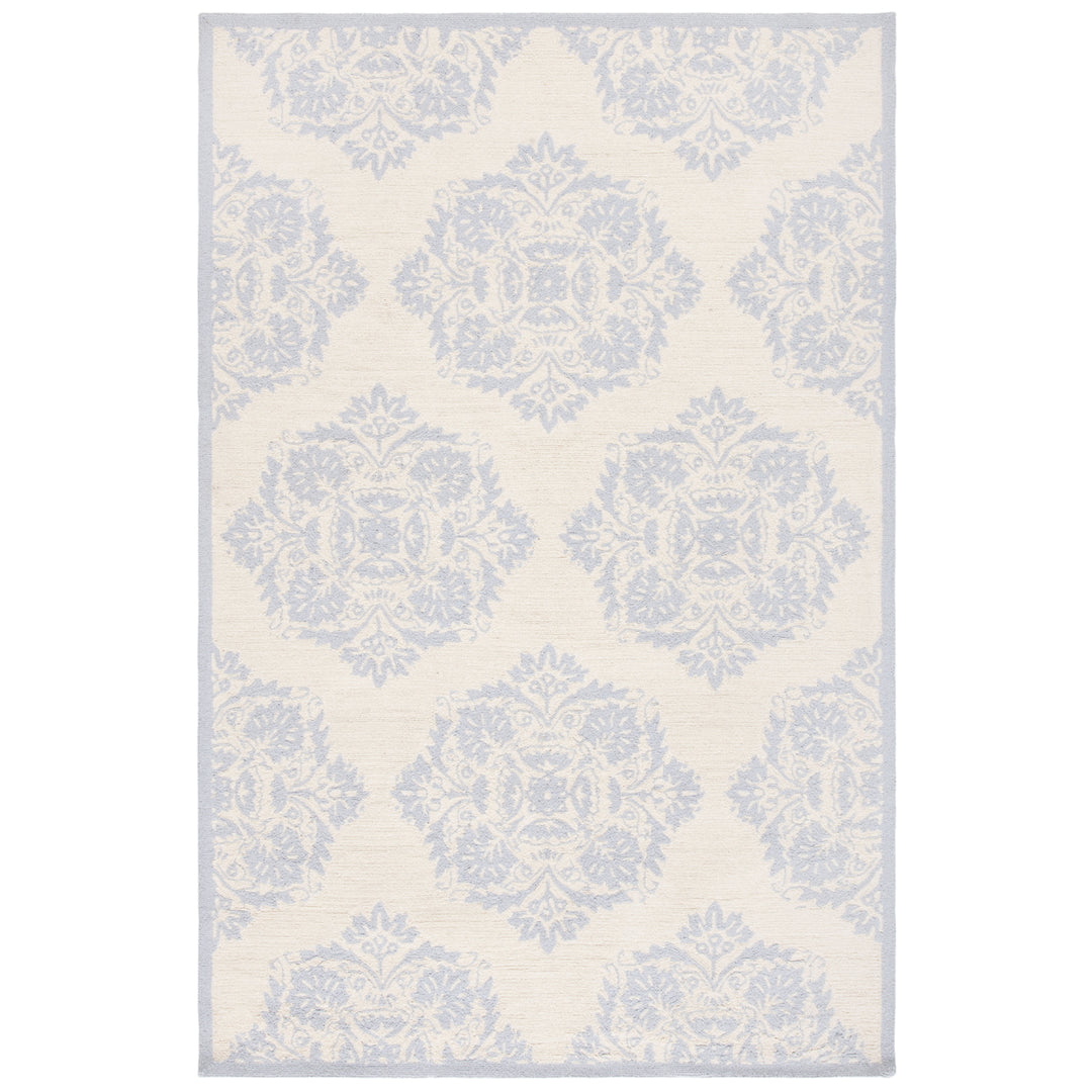 SAFAVIEH Chelsea HK359A Hand-hooked Ivory / Blue Rug Image 1