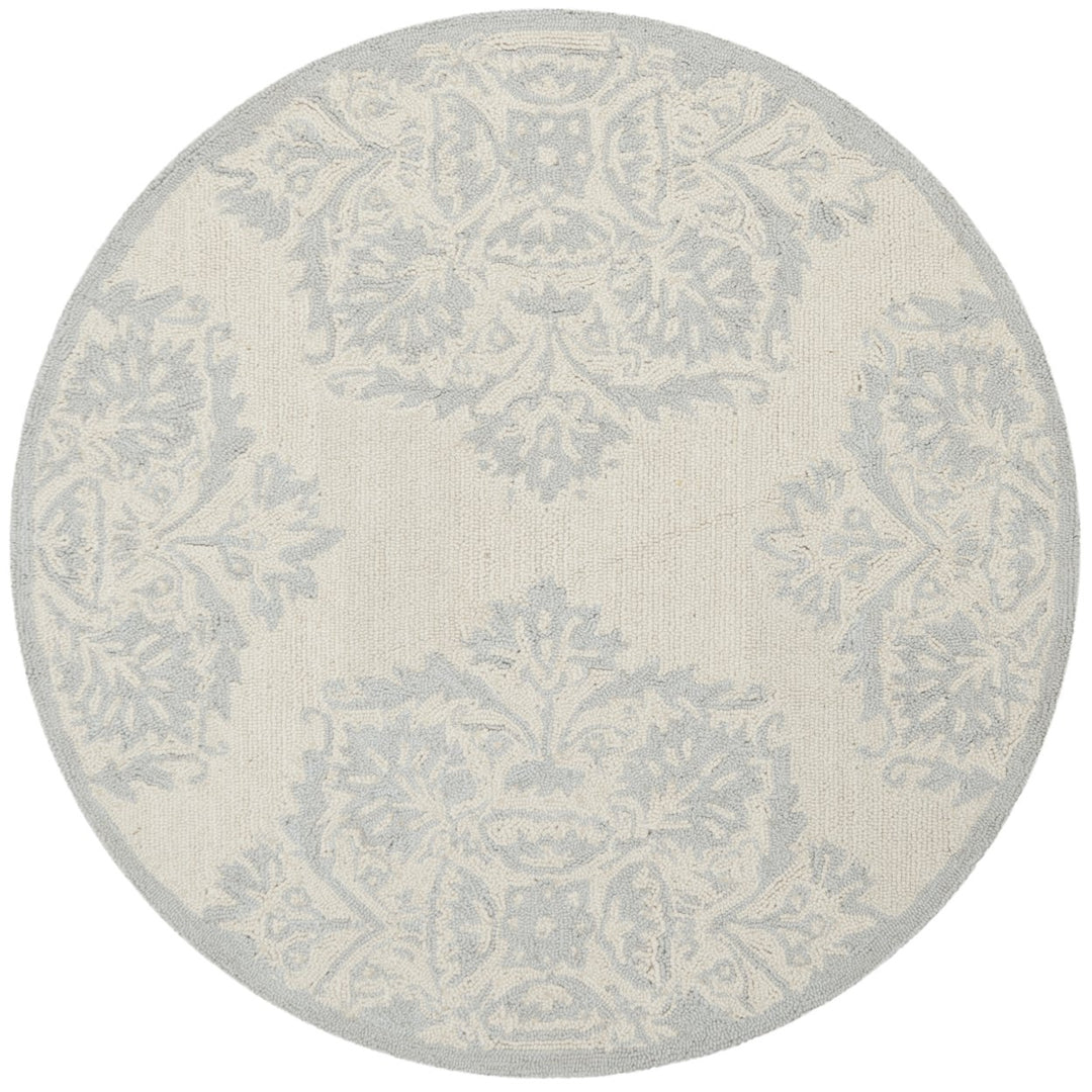 SAFAVIEH Chelsea HK359A Hand-hooked Ivory / Blue Rug Image 1