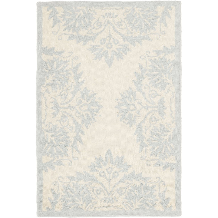 SAFAVIEH Chelsea HK359A Hand-hooked Ivory / Blue Rug Image 1