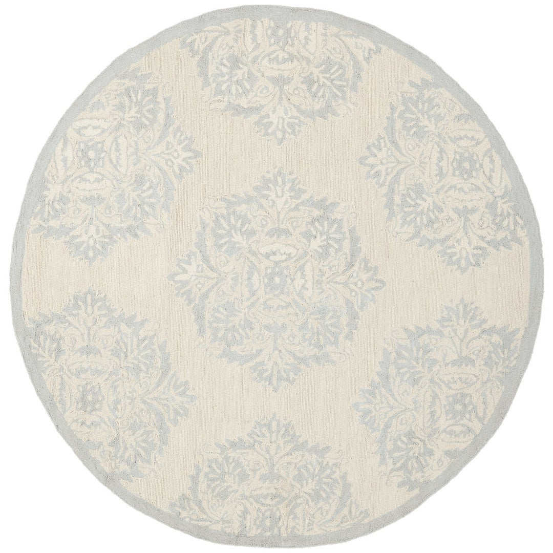 SAFAVIEH Chelsea HK359A Hand-hooked Ivory / Blue Rug Image 1