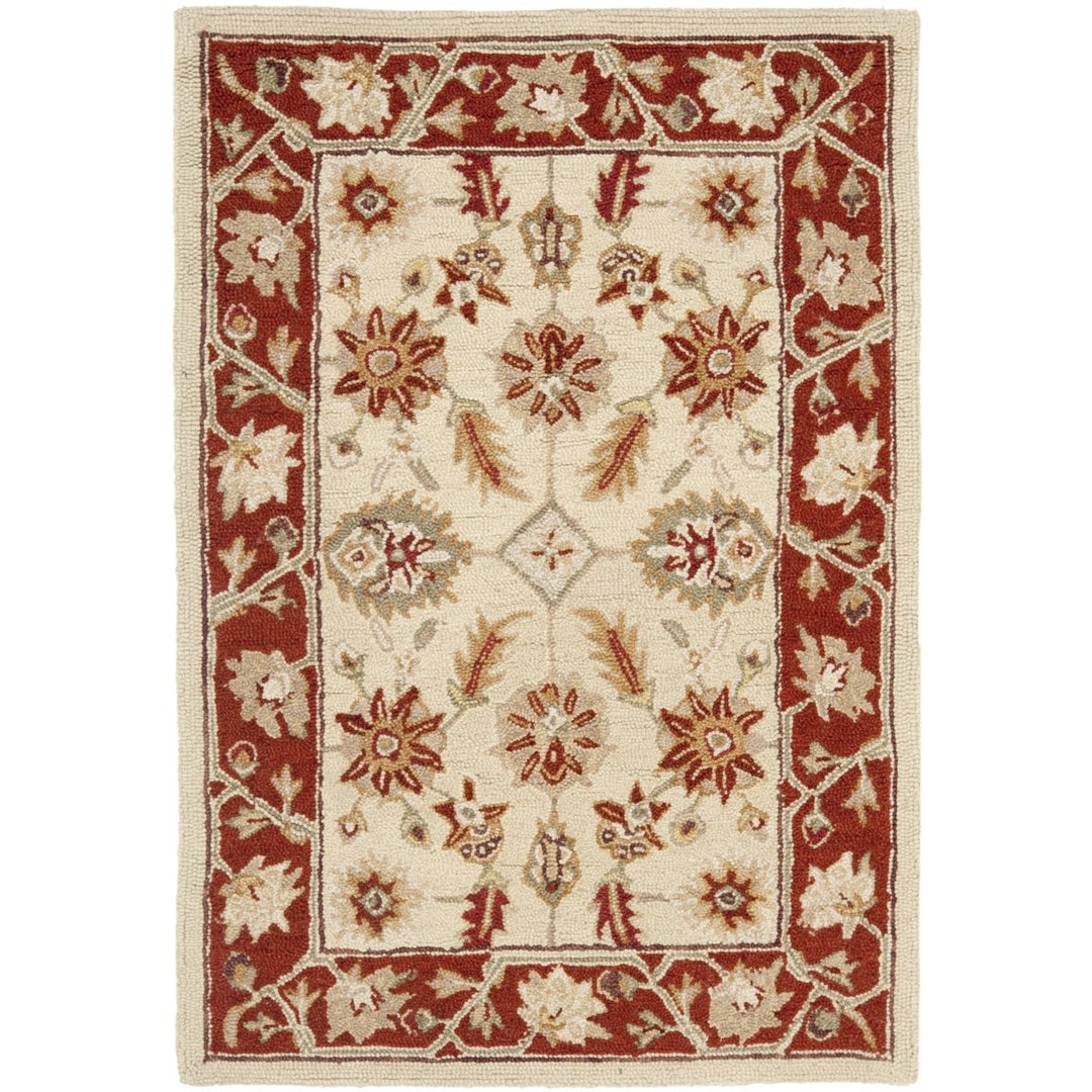 SAFAVIEH Chelsea HK719A Hand-hooked Ivory / Rust Rug Image 1