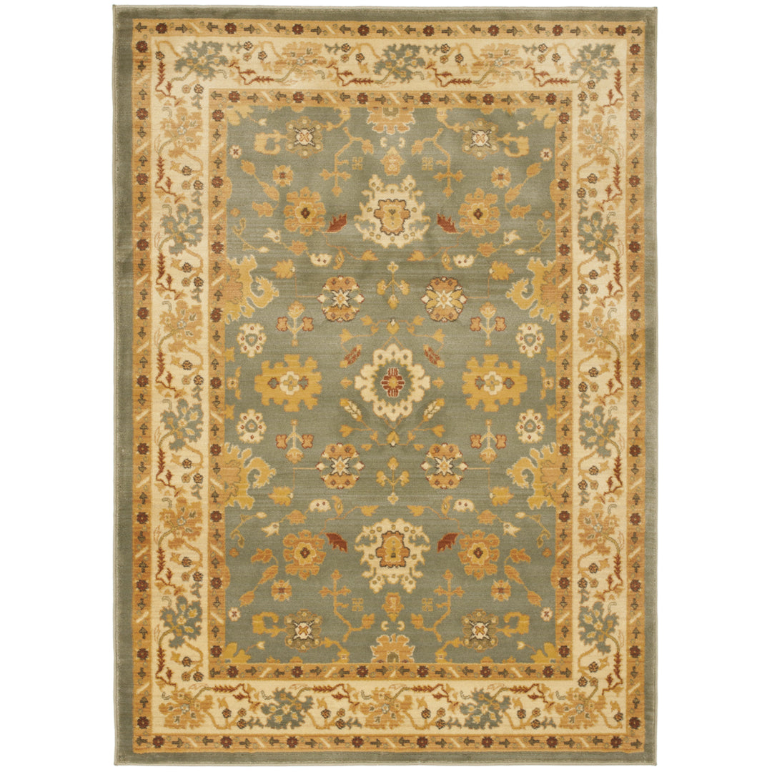 SAFAVIEH Heirloom Collection HLM1738-6511 Blue / Creme Rug Image 1