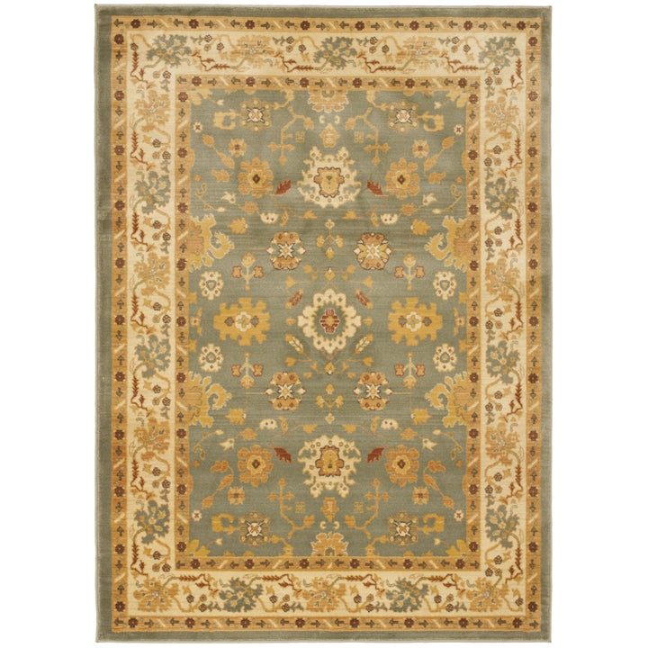 SAFAVIEH Heirloom Collection HLM1738-6511 Blue / Creme Rug Image 1