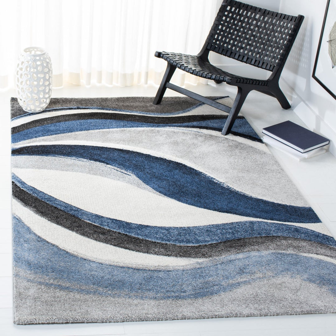 SAFAVIEH Hollywood Collection HLW766F Grey / Blue Rug Image 1