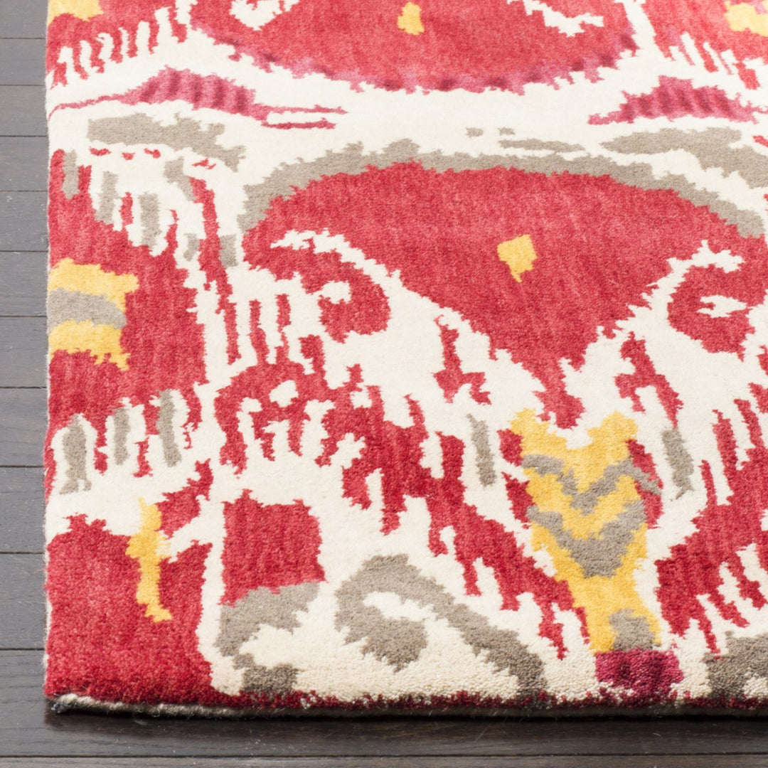 SAFAVIEH Ikat Collection IKT226A Handmade Ivory / Red Rug Image 6