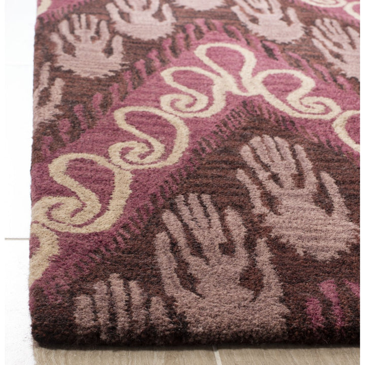 SAFAVIEH Ikat IKT473A Handmade Dark Brown / Purple Rug Image 7