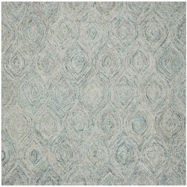 SAFAVIEH Ikat IKT631A Handmade Ivory / Sea Blue Rug Image 1