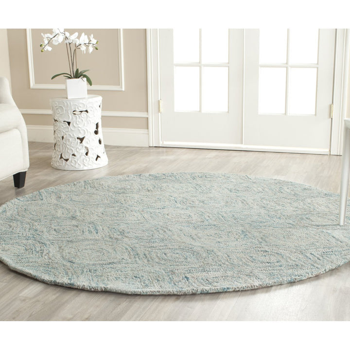 SAFAVIEH Ikat IKT631A Handmade Ivory / Sea Blue Rug Image 8