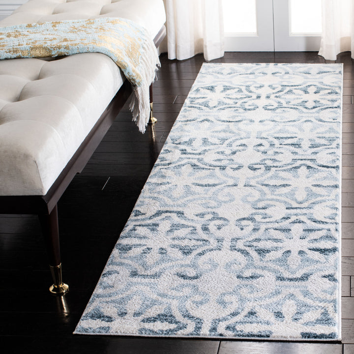 SAFAVIEH Isabella Collection ISA956N Navy / Ivory Rug Image 3