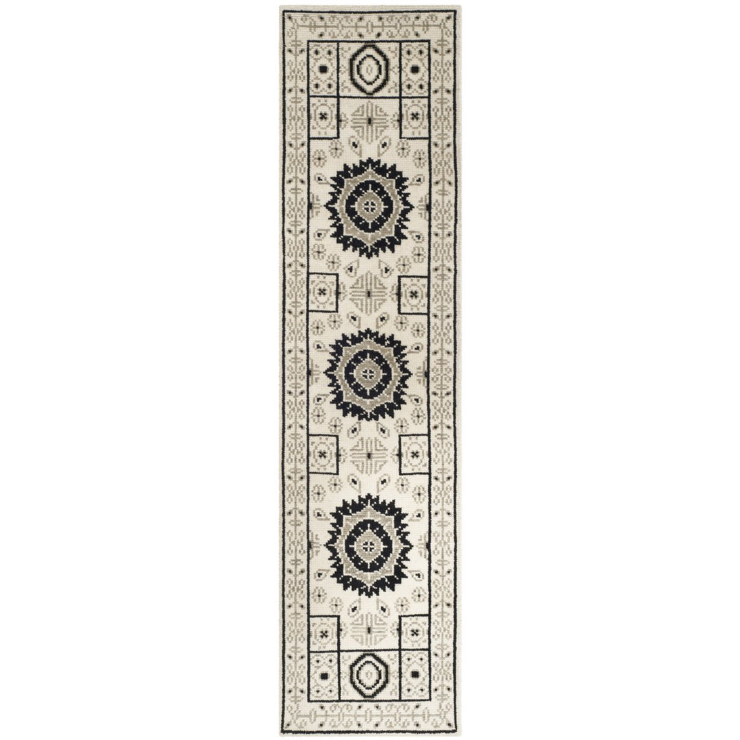 SAFAVIEH Kenya KNY625A Hand-knotted Ivory / Grey Rug Image 1