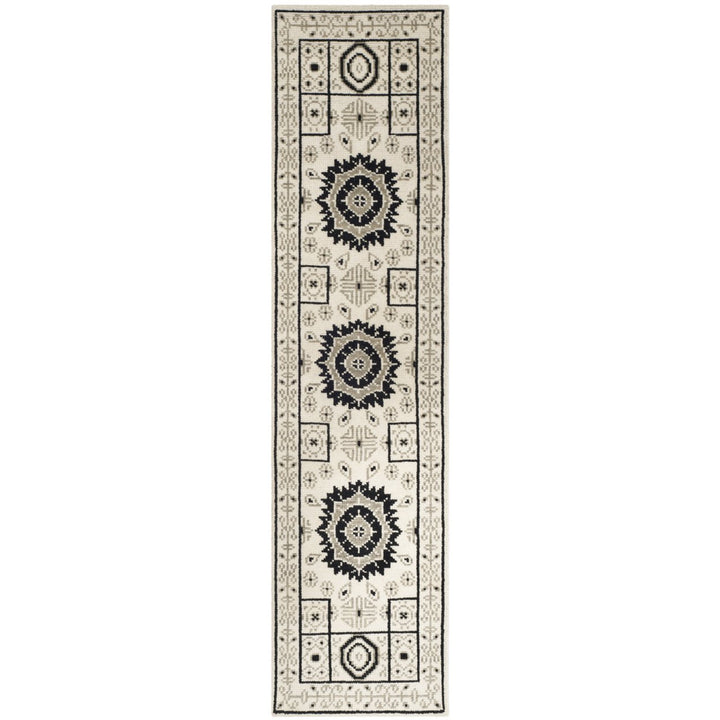 SAFAVIEH Kenya KNY625A Hand-knotted Ivory / Grey Rug Image 1