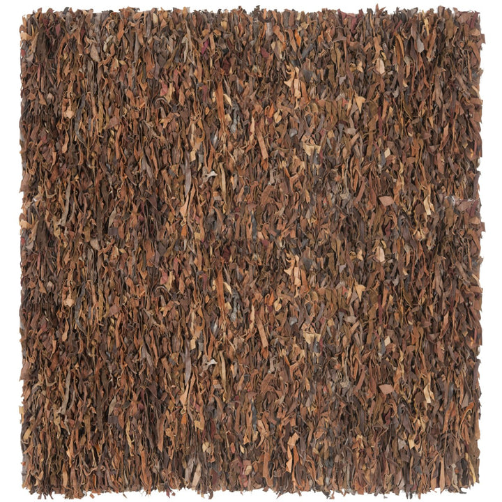 SAFAVIEH Leather Shag LSG511B Hand-knotted Saddle Rug Image 1