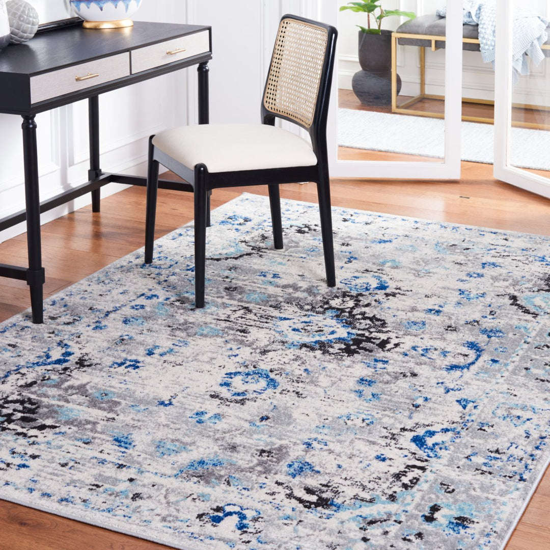 SAFAVIEH Madison Collection MAD154M Ivory / Blue Rug Image 1