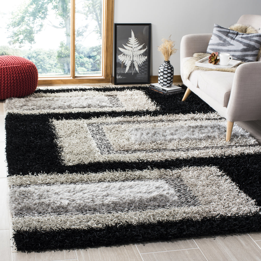 SAFAVIEH Manhattan MAN522B Handmade Black / Grey Rug Image 1