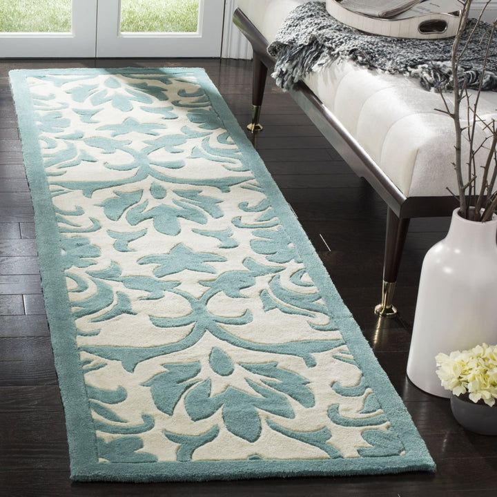 SAFAVIEH Modern Art MDA635A Ivory / Light Blue Rug Image 3