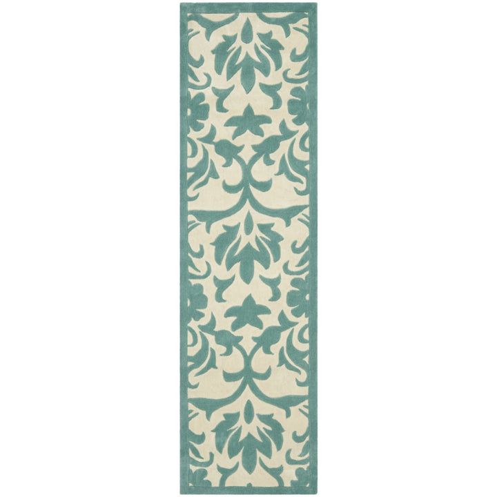 SAFAVIEH Modern Art MDA635A Ivory / Light Blue Rug Image 1