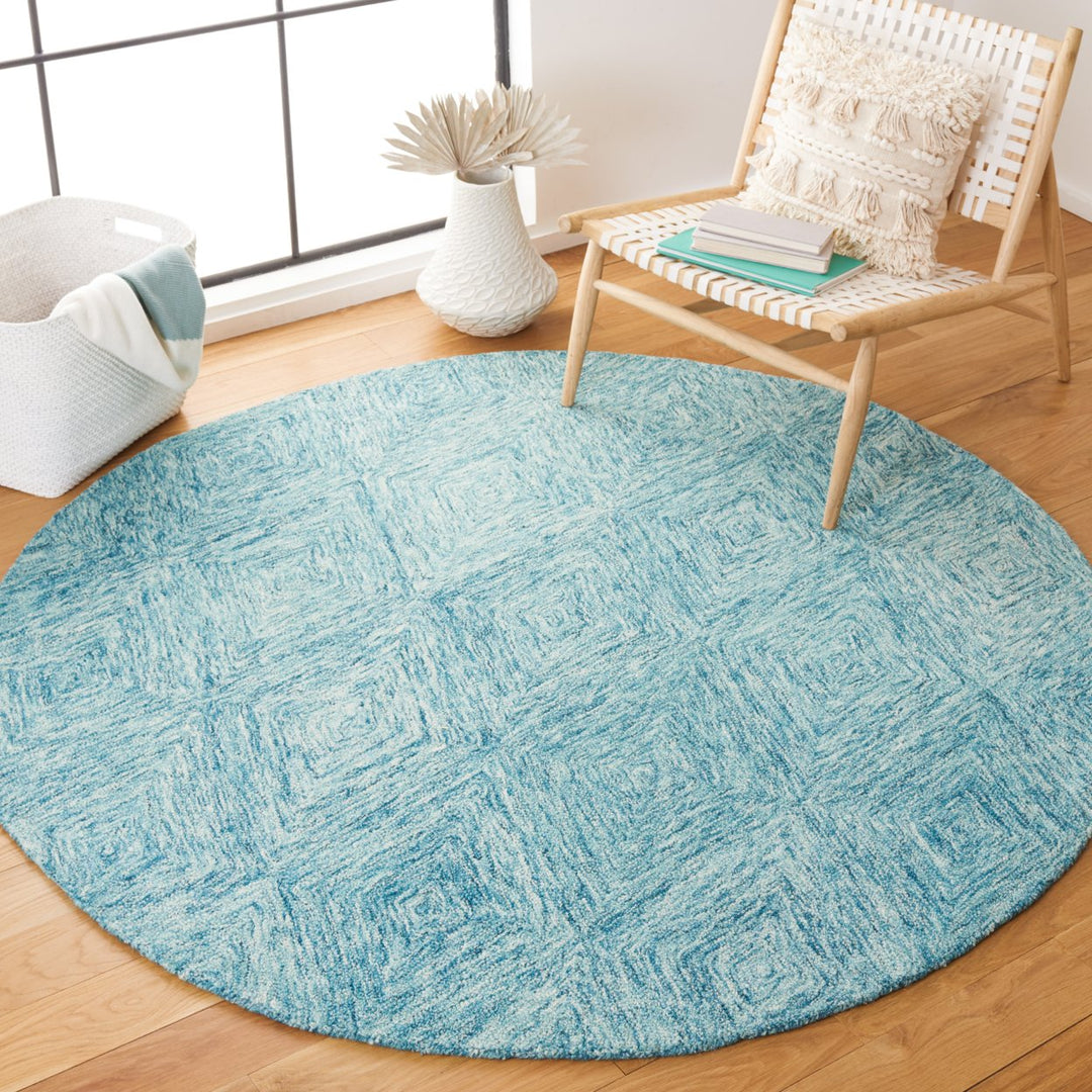 SAFAVIEH Metro Collection MET105J Handmade Light Blue Rug Image 2