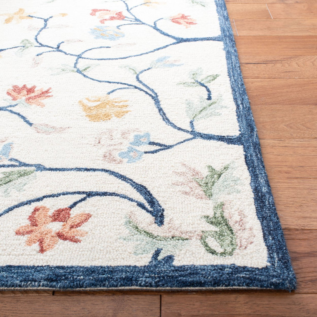 SAFAVIEH Metro MET120A Handmade Ivory / Blue Rug Image 7