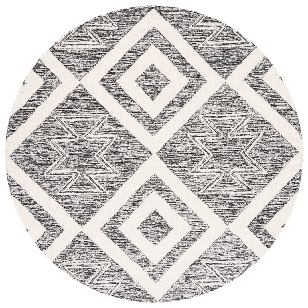 SAFAVIEH Metro MET254A Handmade Ivory / Black Rug Image 1