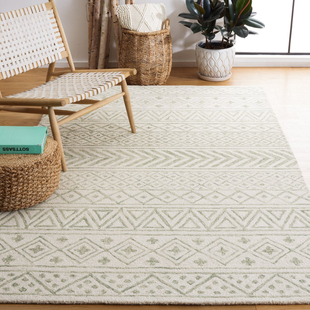 SAFAVIEH Metro MET353X Handmade Ivory / Light Green Rug Image 1