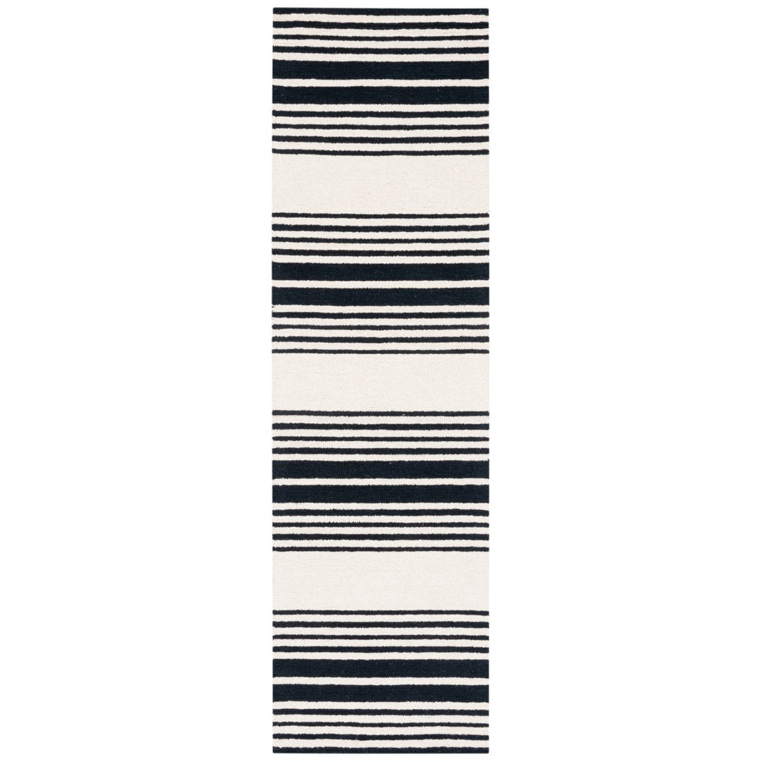 SAFAVIEH Metro MET609A Handmade Ivory / Black Rug Image 1