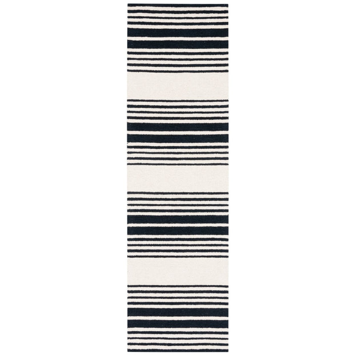 SAFAVIEH Metro MET609A Handmade Ivory / Black Rug Image 1