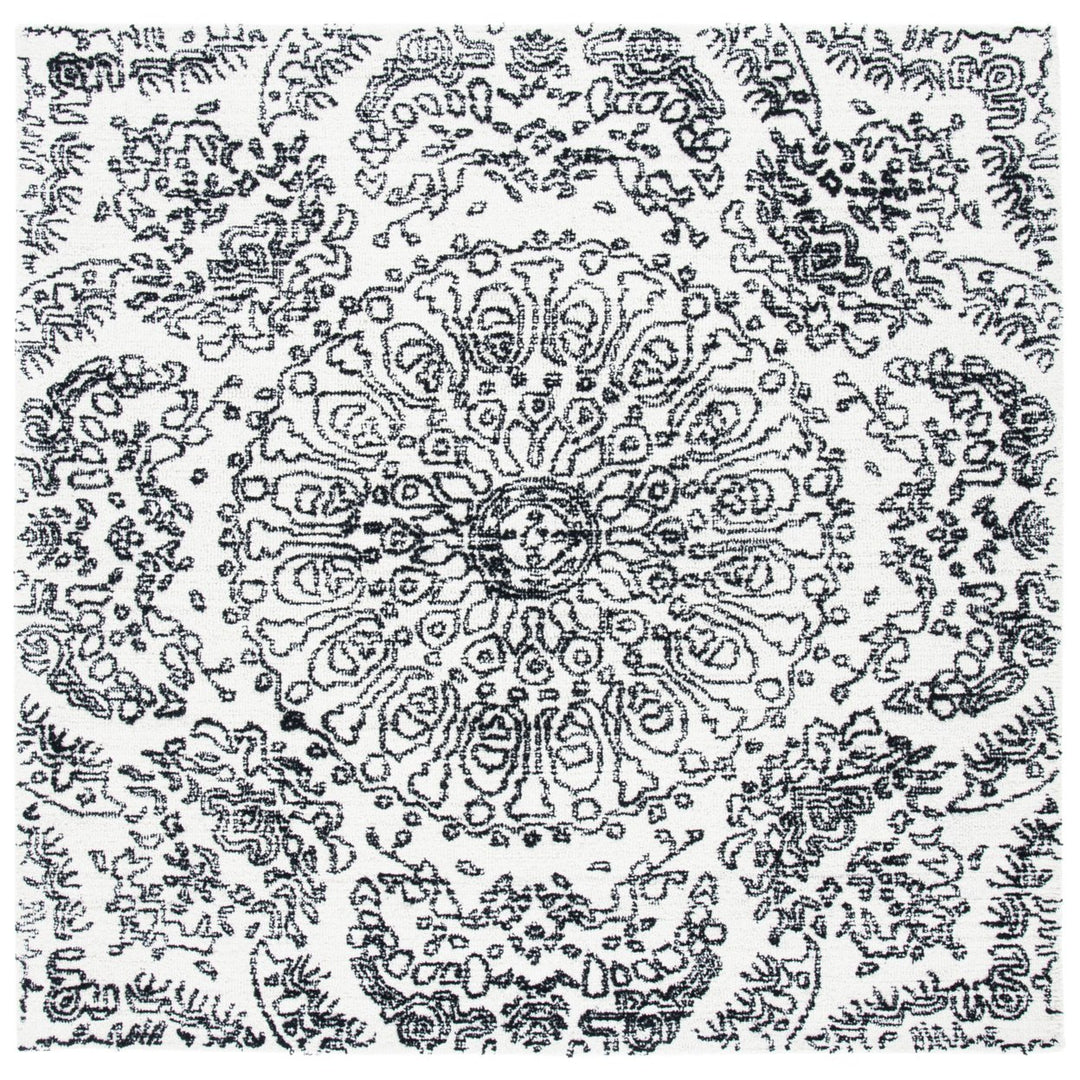 SAFAVIEH Metro MET993A Handmade Ivory / Black Rug Image 1