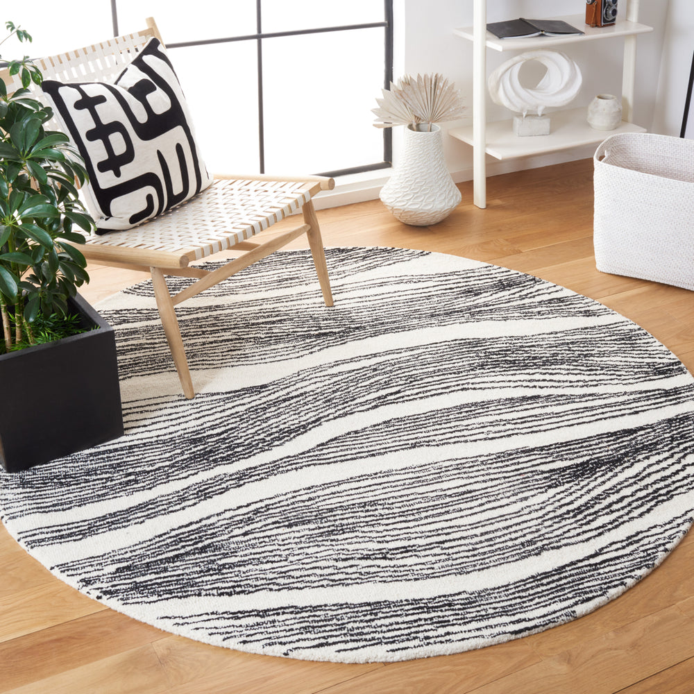 SAFAVIEH Metro MET995B Handmade Ivory / Black Rug Image 2