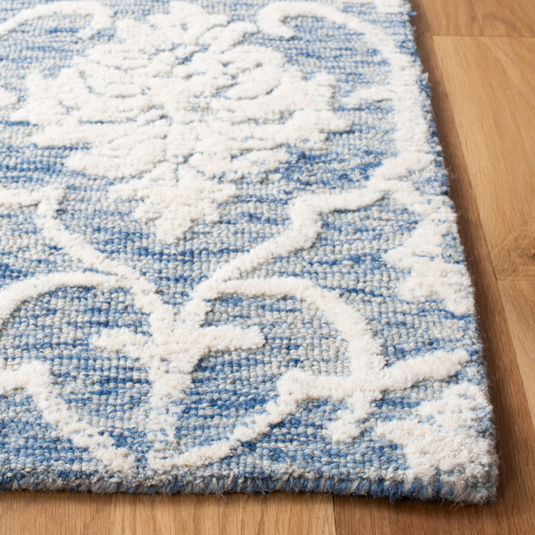 SAFAVIEH Metro MET996M Handmade Blue / Ivory Rug Image 10