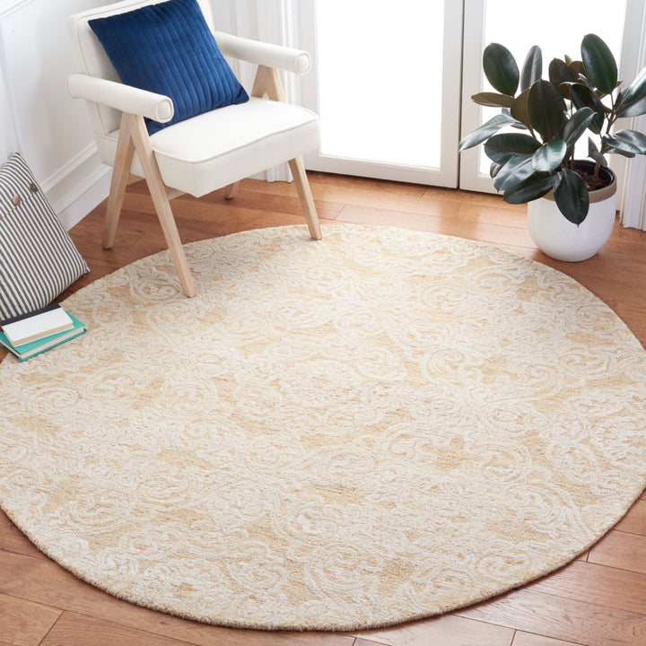 SAFAVIEH Metro MET997D Handmade Gold / Ivory Rug Image 8